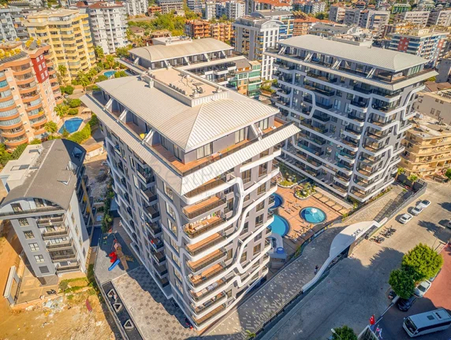 Neues Luxusprojekt mit überdachten Parkplätzen im Stadtteil Tosmur