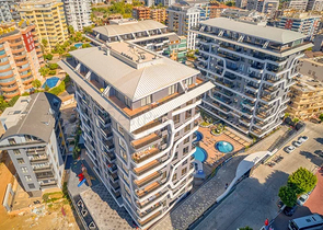 Neues Luxusprojekt mit überdachten Parkplätzen im Stadtteil Tosmur