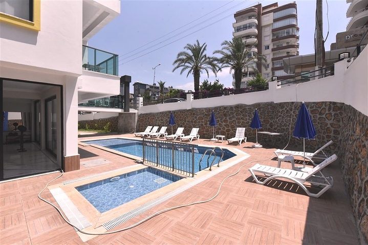 1+1 Wohnung in einem attraktiven Komplex im Stadtteil Tosmur 