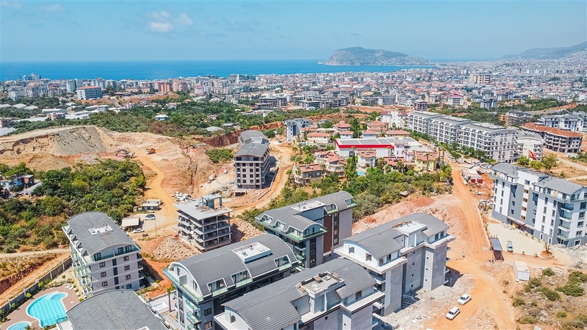 1+1 Wohnung in einem Wohnkomplexprojekt in beiden