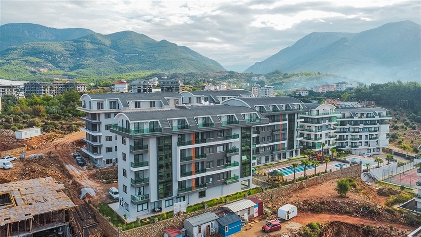 1+1 Wohnung in einem Wohnkomplexprojekt in beiden
