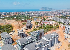 1+1 Wohnung in einem Wohnkomplexprojekt in beiden