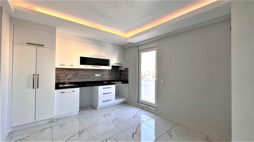 2+1 Penthouse im Zentrum von Mahmutlar mit Blick auf die Berge 