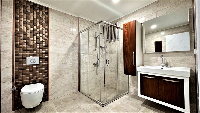 2+1 Penthouse im Zentrum von Mahmutlar mit Blick auf die Berge 