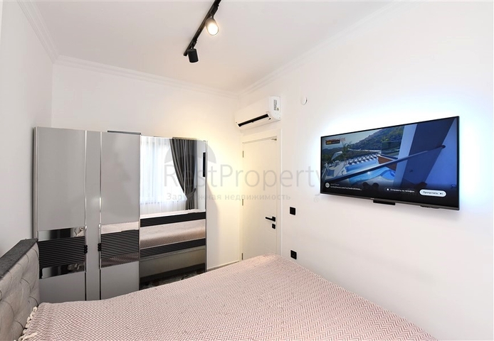 Möblierte Wohnung mit einem Schlafzimmer in einem Komplex in einem Kiefernwald