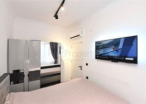 Möblierte Wohnung mit einem Schlafzimmer in einem Komplex in einem Kiefernwald