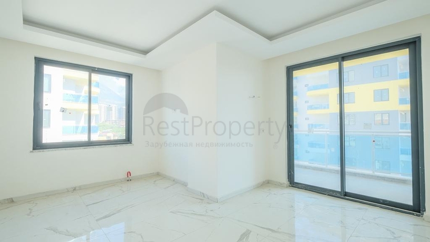 1+1 Wohnung in einem neuen Komplex im Stadtteil Mahmutlar