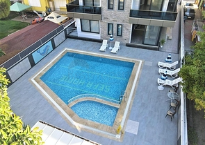 Wohnung in einem neuen Haus 300 m vom Meer entfernt im Zentrum von Alanya