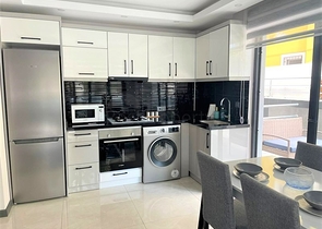 Wohnung in einem neuen Haus 300 m vom Meer entfernt im Zentrum von Alanya