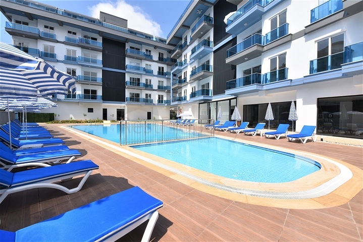 Penthouse 2+1 mit Möbeln in einem modernen Komplex in beiden