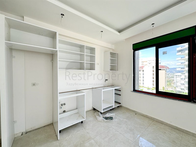 1+1 Wohnung in einem im Bau befindlichen Haus im Stadtteil Mahmutlar