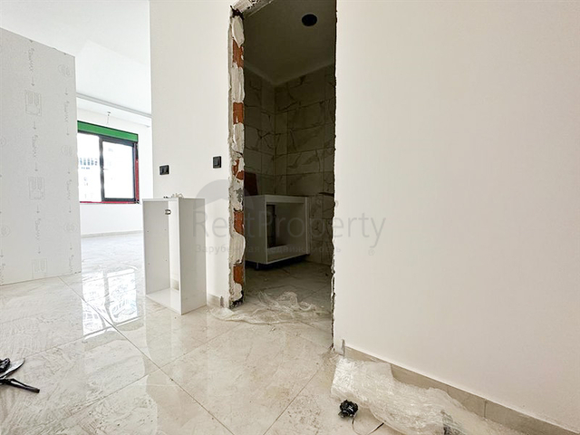 1+1 Wohnung in einem im Bau befindlichen Haus im Stadtteil Mahmutlar