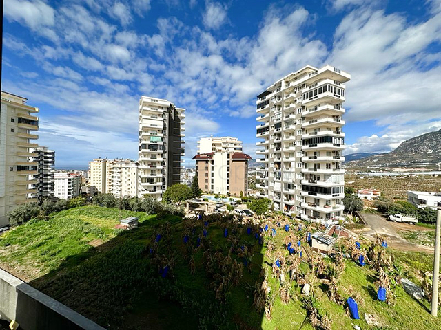 1+1 Wohnung in einem im Bau befindlichen Haus im Stadtteil Mahmutlar