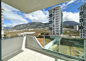 1+1 Wohnung in einem im Bau befindlichen Haus im Stadtteil Mahmutlar