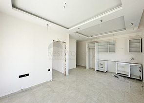 1+1 Wohnung in einem im Bau befindlichen Haus im Stadtteil Mahmutlar