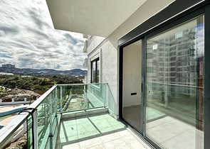 1+1 Wohnung in einem im Bau befindlichen Haus im Stadtteil Mahmutlar