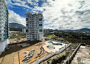 1+1 Wohnung in einem im Bau befindlichen Haus im Stadtteil Mahmutlar