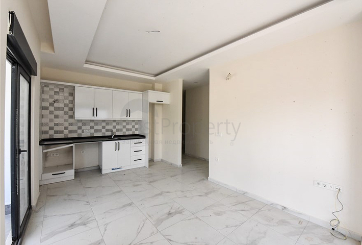 1+1 Wohnung in einem neuen Komplex ohne Infrastruktur im Stadtteil Mahmutlar