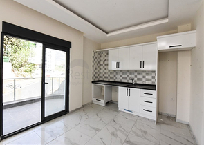 1+1 Wohnung in einem neuen Komplex ohne Infrastruktur im Stadtteil Mahmutlar