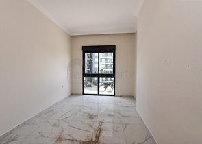 1+1 Wohnung in einem neuen Komplex ohne Infrastruktur im Stadtteil Mahmutlar