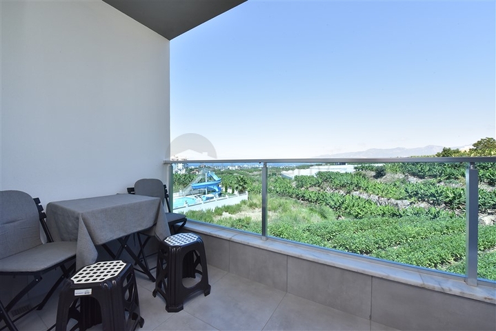 1+1 möblierte Wohnung mit Meer- und Bergblick im Stadtteil Mahmutlar