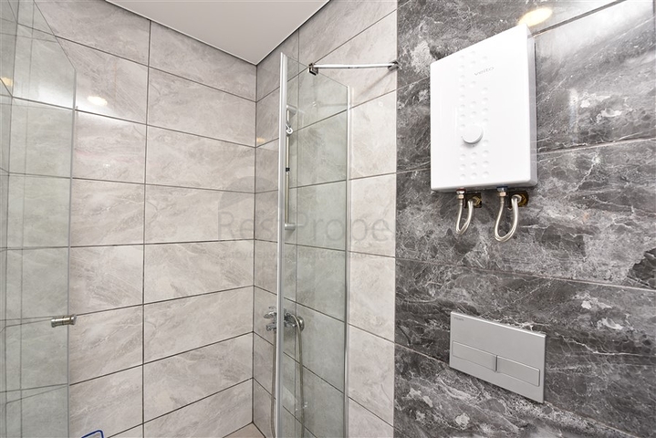 1+1 möblierte Wohnung mit Meer- und Bergblick im Stadtteil Mahmutlar