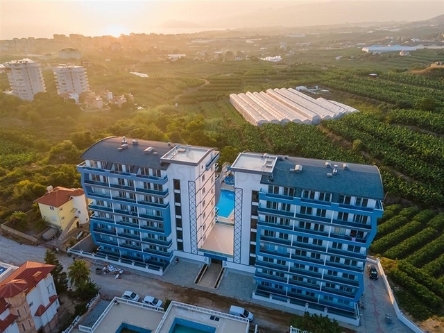 1+1 möblierte Wohnung mit Meer- und Bergblick im Stadtteil Mahmutlar