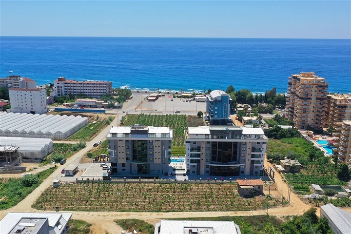 1+1 möblierte Wohnung in einem neuen Komplex im Stadtteil Kargicak