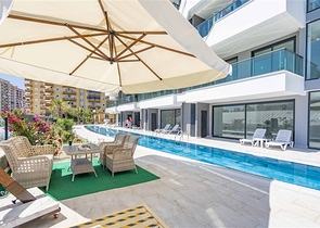 1+1 möblierte Wohnung in einem neuen Komplex im Stadtteil Kargicak