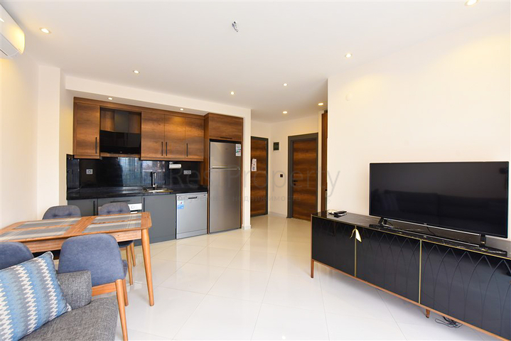 Gemütliche 1+1 Wohnung in einer beliebten Wohnanlage im Stadtteil Mahmutlar