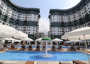 Gemütliche 1+1 Wohnung in einer beliebten Wohnanlage im Stadtteil Mahmutlar