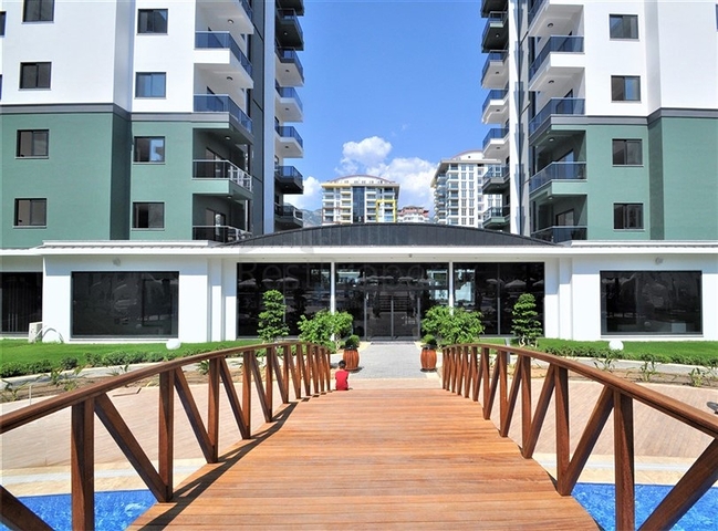 1+1 Apartment in einem Komplex mit Hotelinfrastruktur im Stadtteil Mahmutlar