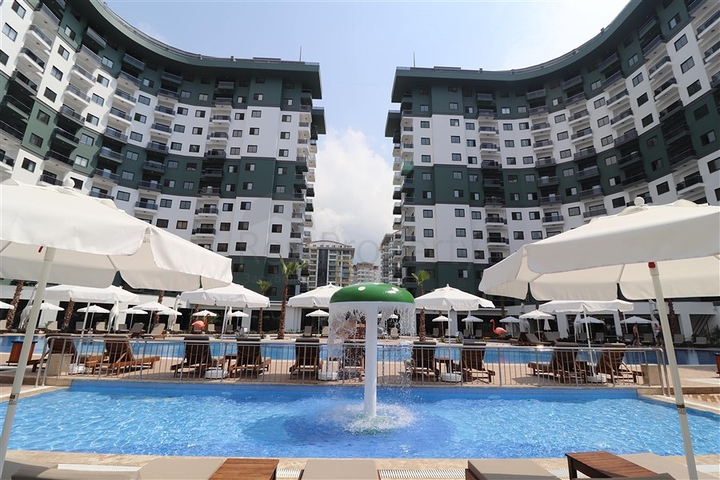 1+1 Apartment in einem Komplex mit Hotelinfrastruktur im Stadtteil Mahmutlar