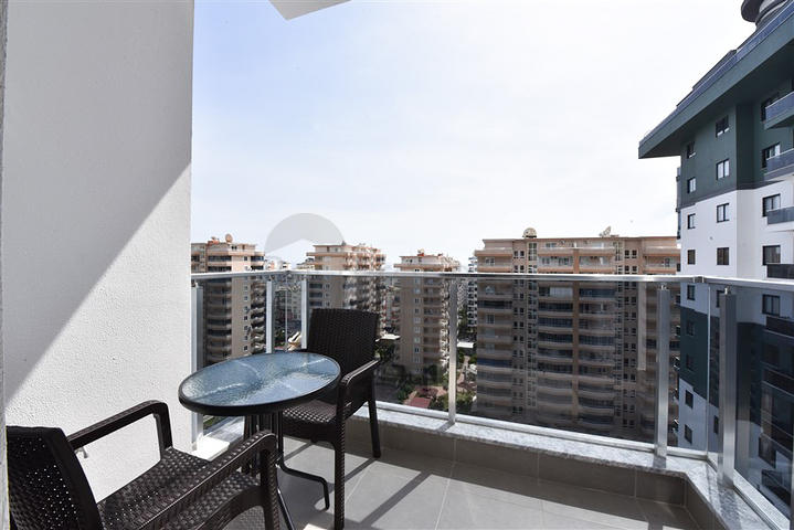 1+1 Apartment in einem Komplex mit Hotelinfrastruktur im Stadtteil Mahmutlar