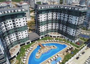 1+1 Apartment in einem Komplex mit Hotelinfrastruktur im Stadtteil Mahmutlar