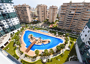 1+1 Apartment in einem Komplex mit Hotelinfrastruktur im Stadtteil Mahmutlar