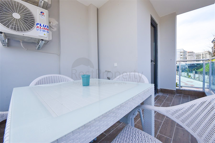 1+1 Wohnung mit Möbeln und Geräten, im Stadtteil Mahmutlar