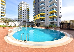 1+1 Wohnung mit Möbeln und Geräten, im Stadtteil Mahmutlar