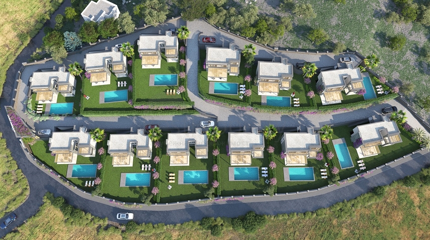 Villen in der malerischen Gegend von Turkbükü, umgeben von dichtem Grün. 