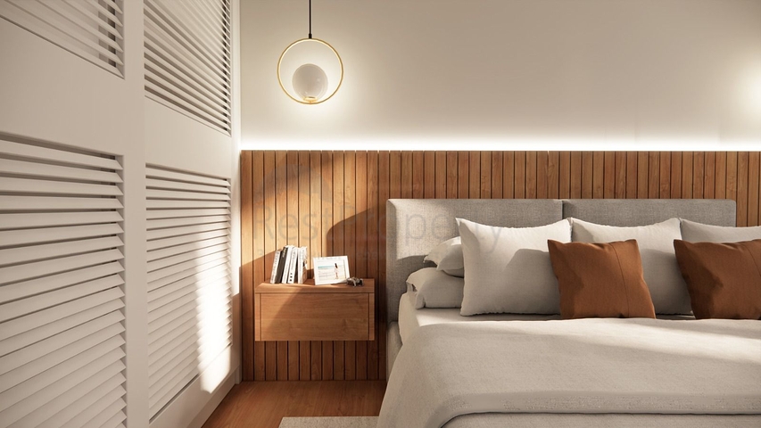 Villen in der malerischen Gegend von Turkbükü, umgeben von dichtem Grün. 