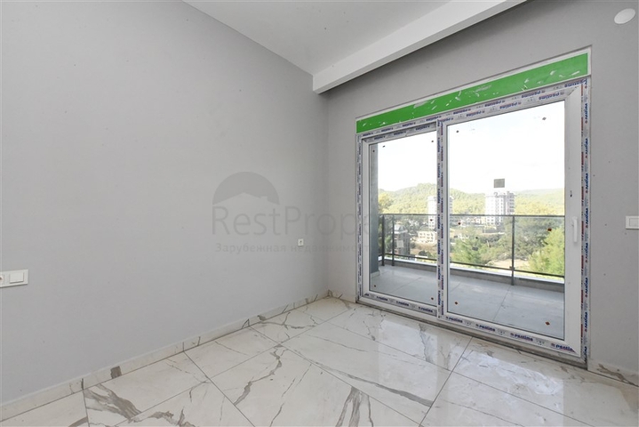 1+1 Wohnung in einem neuen Komplex im Stadtteil Avsallar