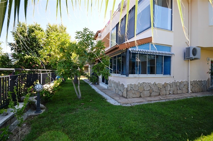 Gemütliche 2+1 Wohnung mit eigenem Gartengrundstück