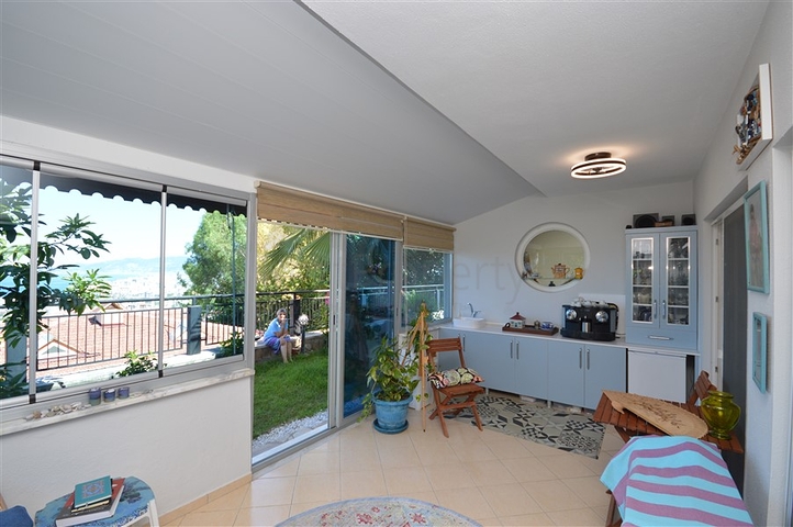 Gemütliche 2+1 Wohnung mit eigenem Gartengrundstück