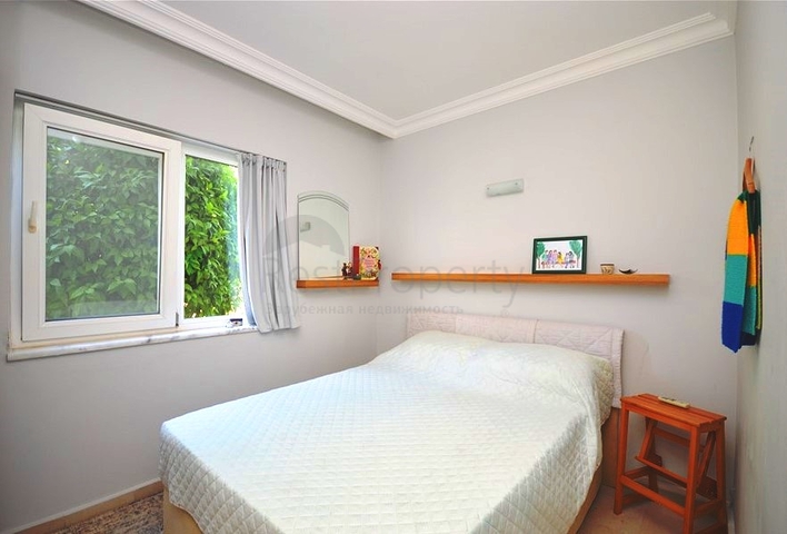 Gemütliche 2+1 Wohnung mit eigenem Gartengrundstück