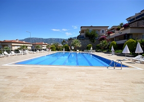 Gemütliche 2+1 Wohnung mit eigenem Gartengrundstück