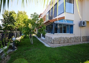 Gemütliche 2+1 Wohnung mit eigenem Gartengrundstück