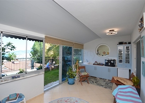 Gemütliche 2+1 Wohnung mit eigenem Gartengrundstück