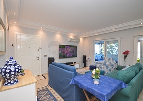 Gemütliche 2+1 Wohnung mit eigenem Gartengrundstück