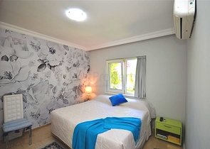 Gemütliche 2+1 Wohnung mit eigenem Gartengrundstück