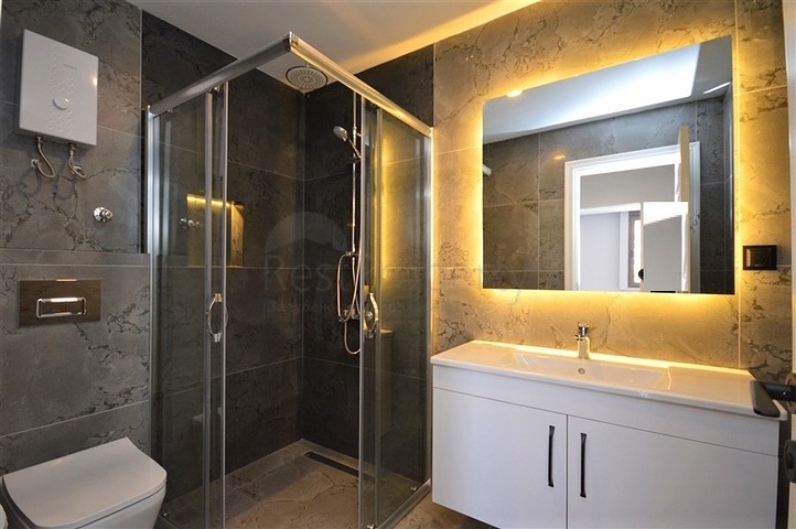 Präsentiert Ihnen eine 1+1 Wohnung zu Fuß zum Meer in der Nähe von Oba